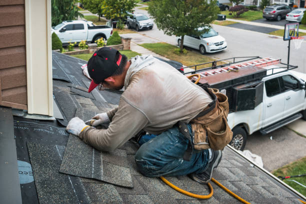 Professional Storm Damage Roof Repair technician working in Marshall, VA
